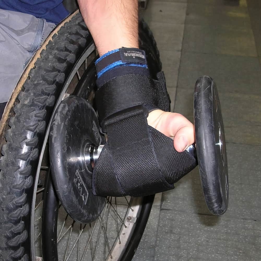 A free weight or dumbbell being held using a General Purpose gripping aid