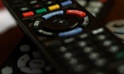 Three television remotes