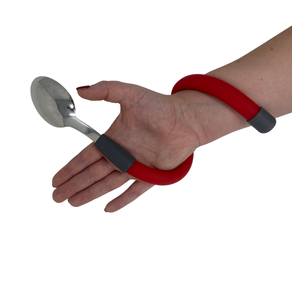 Long bendable spoon on a hand - showing the back