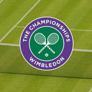 Image shows the wimbledon logo of two crossed tennis rackets in a purple circle. In the background is a tennis net and grass court.
