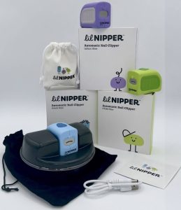 Image shows product range from clip different. A stack of branded boxes, a POD adaptor and two lil nipper nail clippers in green and purple.