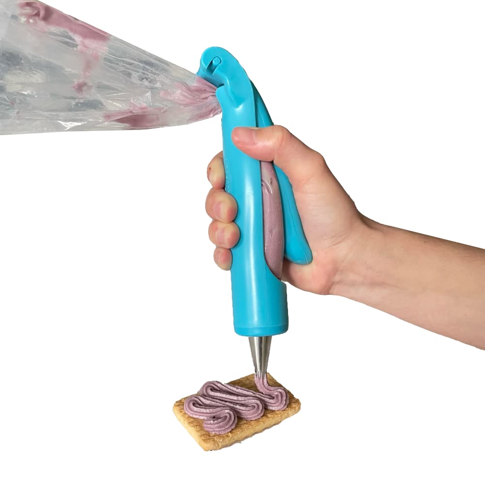 the icing pen is a device for people with one-hand or reduced hand function to ice cakes and biscuits